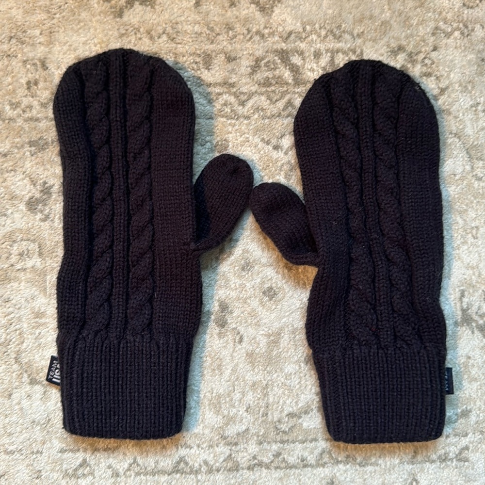 Olympic mittens with ‘Go USA’ on the palms